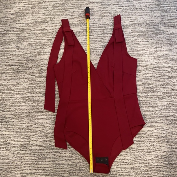 NWT “Oh My Love “ burgundy sleeveless bodysuit with bow accent. Size Med… - Picture 6 of 8